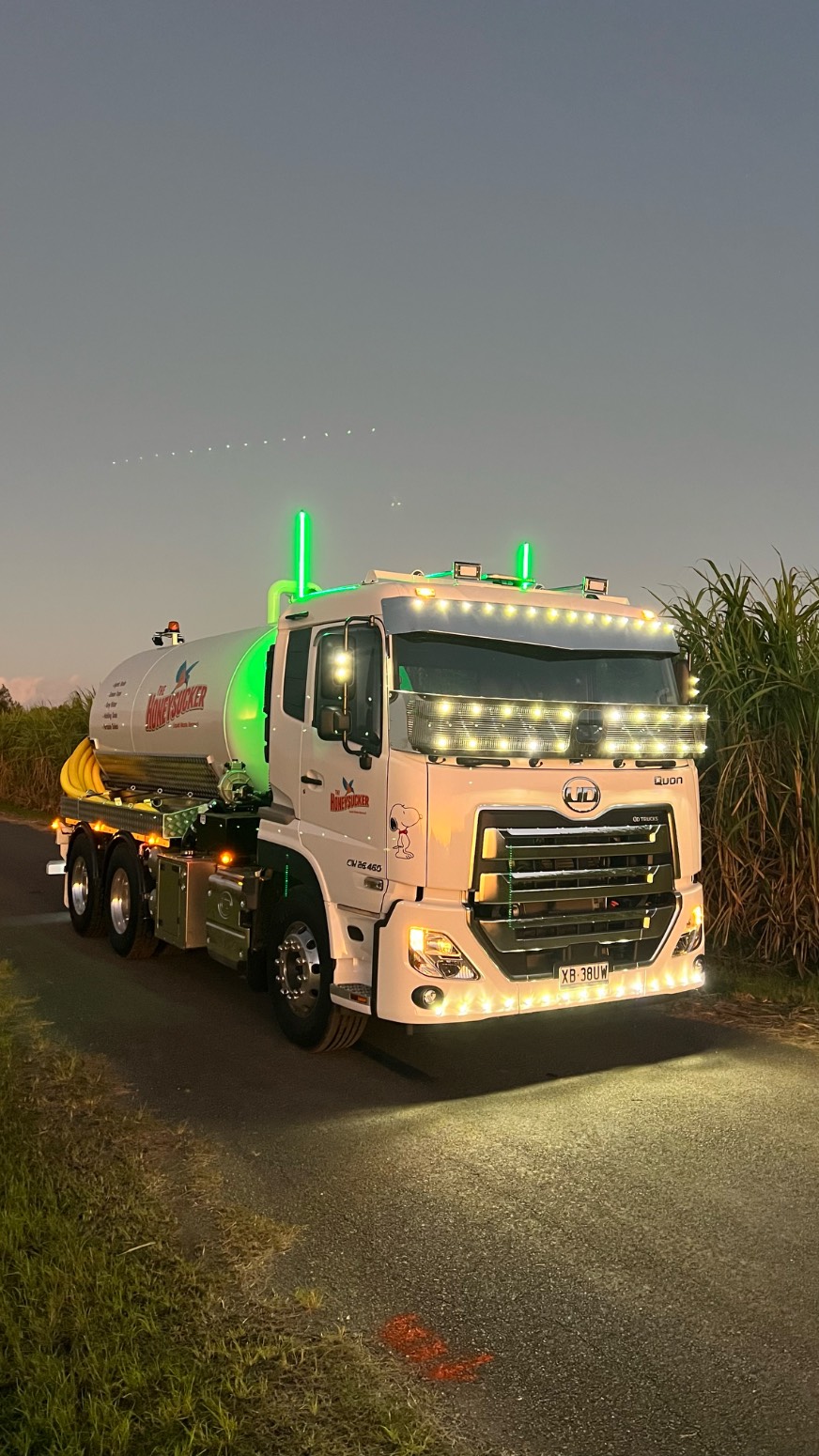The Honeysucker tanker truck at dusk
